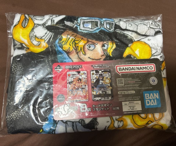 CONV0096 Producto cotizado: Ichiban Kuji One Piece - Manta con diseño de cartas